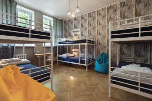 Posteľ alebo postele v izbe v ubytovaní Tatamka Hostel