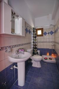 Ванная комната в Niki Apartments