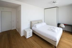 Postel nebo postele na pokoji v ubytování Capo Torre Resort & SPA + 63 fotografií