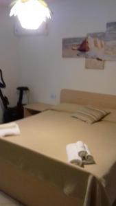 Posteľ alebo postele v izbe v ubytovaní Affittacamere da Rosa