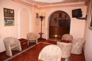 Sjónvarps- og/eða afþreyingartæki á Garni Hotel PBG