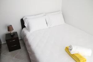 Postel nebo postele na pokoji v ubytování S&S Pura Vida Apartment