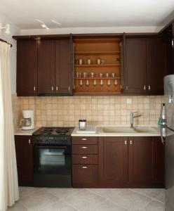Kuchyň nebo kuchyňský kout v ubytování S&S Pura Vida Apartment