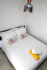 Postel nebo postele na pokoji v ubytování S&S Pura Vida Apartment
