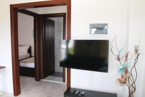 TV a/nebo společenská místnost v ubytování S&S Pura Vida Apartment