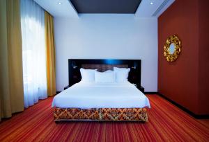 Postel nebo postele na pokoji v ubytování Nane Hotel