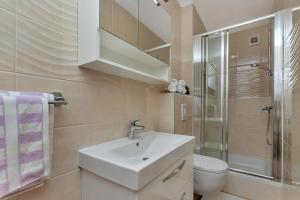 Kúpeľňa v ubytovaní Sun&Sea 4 stars apartment