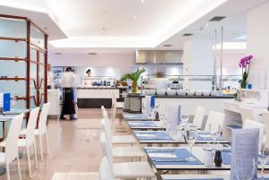 A restaurant or other place to eat at Reverence Life Hotel - Adults Only