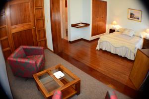 Postel nebo postele na pokoji v ubytování Hotel Crown
