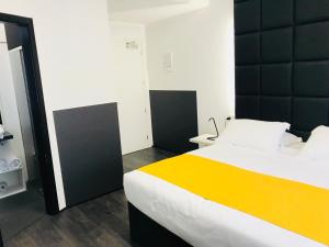 Postel nebo postele na pokoji v ubytování Hotel Pex Padova