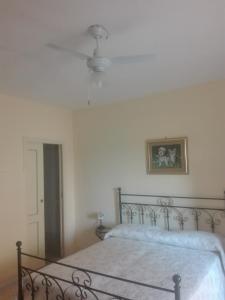 Postel nebo postele na pokoji v ubytování Casa Lorella