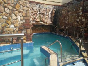 Bazén v ubytování 9 Queens Spa Hotel nebo v jeho okolí