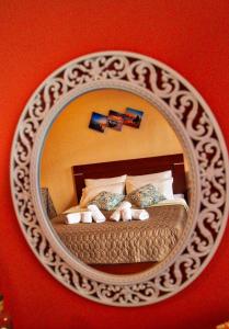 A bed or beds in a room at Arianna Studios 7