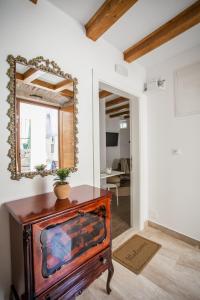 a mirror on top of a dresser in a room at Villa Lucia in Trogir