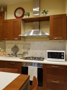 Nhà bếp/bếp nhỏ tại Domus Dea +26 ảnh