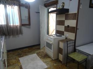 Kuchyňa alebo kuchynka v ubytovaní Carmen maisonette