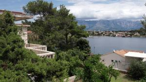 a view of the lake from a house at Foltyn Holiday Home in Selca
