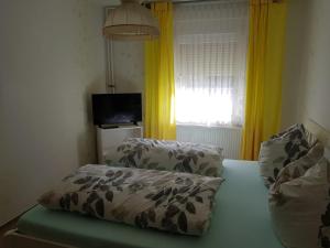 Postel nebo postele na pokoji v ubytování Pension Angelika