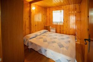 Postel nebo postele na pokoji v ubytování Camping Gironella