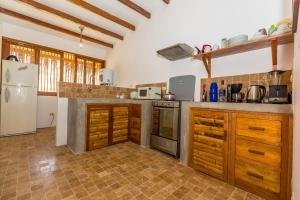 Η κουζίνα ή μικρή κουζίνα στο Penthouse Kahuna