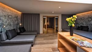 Predel za sedenje v nastanitvi Hotel ANDER