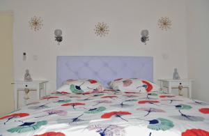 מיטה או מיטות בחדר ב-Au mazet de Carmélina