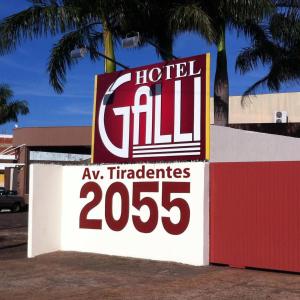 a sign for a hotelall with a hotelall sign at Hotel Galli in Londrina