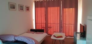 Postel nebo postele na pokoji v ubytování Apartmani Jozic