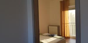 Postel nebo postele na pokoji v ubytování Apartmani Jozic