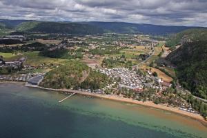 an aerial view of a town on the beach at Rosfjord Strandhotel in Lyngdal