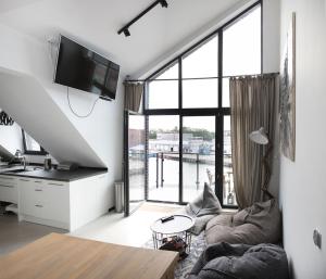 Telewizja i/lub zestaw kina domowego w obiekcie Apartamenty Port Ustka