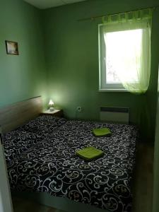 Posteľ alebo postele v izbe v ubytovaní Apartmany-Anna