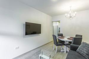 TV a/nebo společenská místnost v ubytování Apartments Luce and Antonio