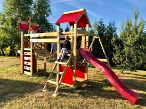 Herní místnost nebo prostor pro děti v ubytování Domki Baltyk