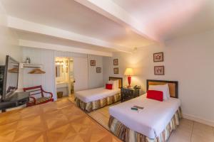 Postel nebo postele na pokoji v ubytování Hotel Moloka'i