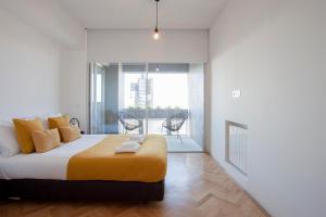 Posteľ alebo postele v izbe v ubytovaní Liiiving in Porto | Downtown Secret Luxury Apartments