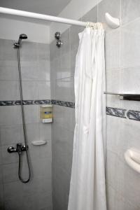 Um banheiro em Abril Hotel Boutique