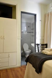 Cama ou camas em um quarto em Abril Hotel Boutique