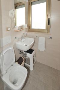 Koupelna v ubytování Hotel Lidia