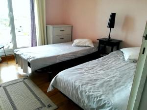 Postel nebo postele na pokoji v ubytování Apart 75m2 - 2 rooms - Parking