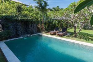 Afbeelding uit fotogalerij van Koming Guest House in Canggu