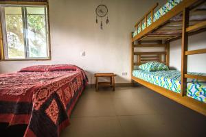 Poschodová posteľ alebo postele v izbe v ubytovaní Indigo Palomino