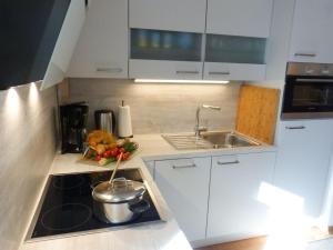 Kuchyň nebo kuchyňský kout v ubytování Ferienwohnung Hörmann