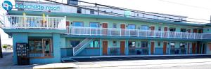 a building on the corner of a street at Beachside Resort in Wildwood