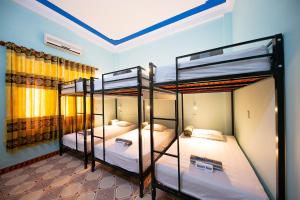 Ένα ή περισσότερα κρεβάτια σε δωμάτιο στο Bamboo's House