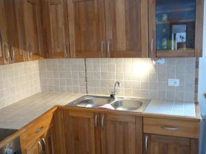 Kuchyň nebo kuchyňský kout v ubytování Casa Screm - Appartamenti e Camere -Rigolato - UD + 37 fotografií