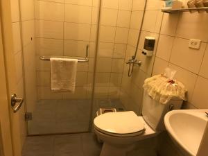 Koupelna v ubytování Kuo Kuang Hostel + 20 fotografií