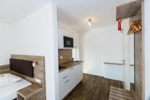 Postel nebo postele na pokoji v ubytování Come IN Hotel