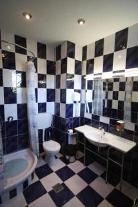 Kúpeľňa v ubytovaní Hotel Anca