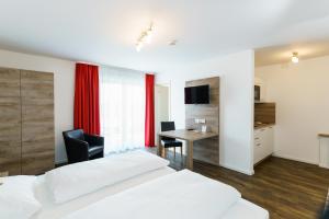 TV a/nebo společenská místnost v ubytování Come IN Hotel